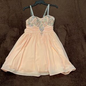 Pink mini party dress with crystal design. Chiffon size 9 Rhinestone straps